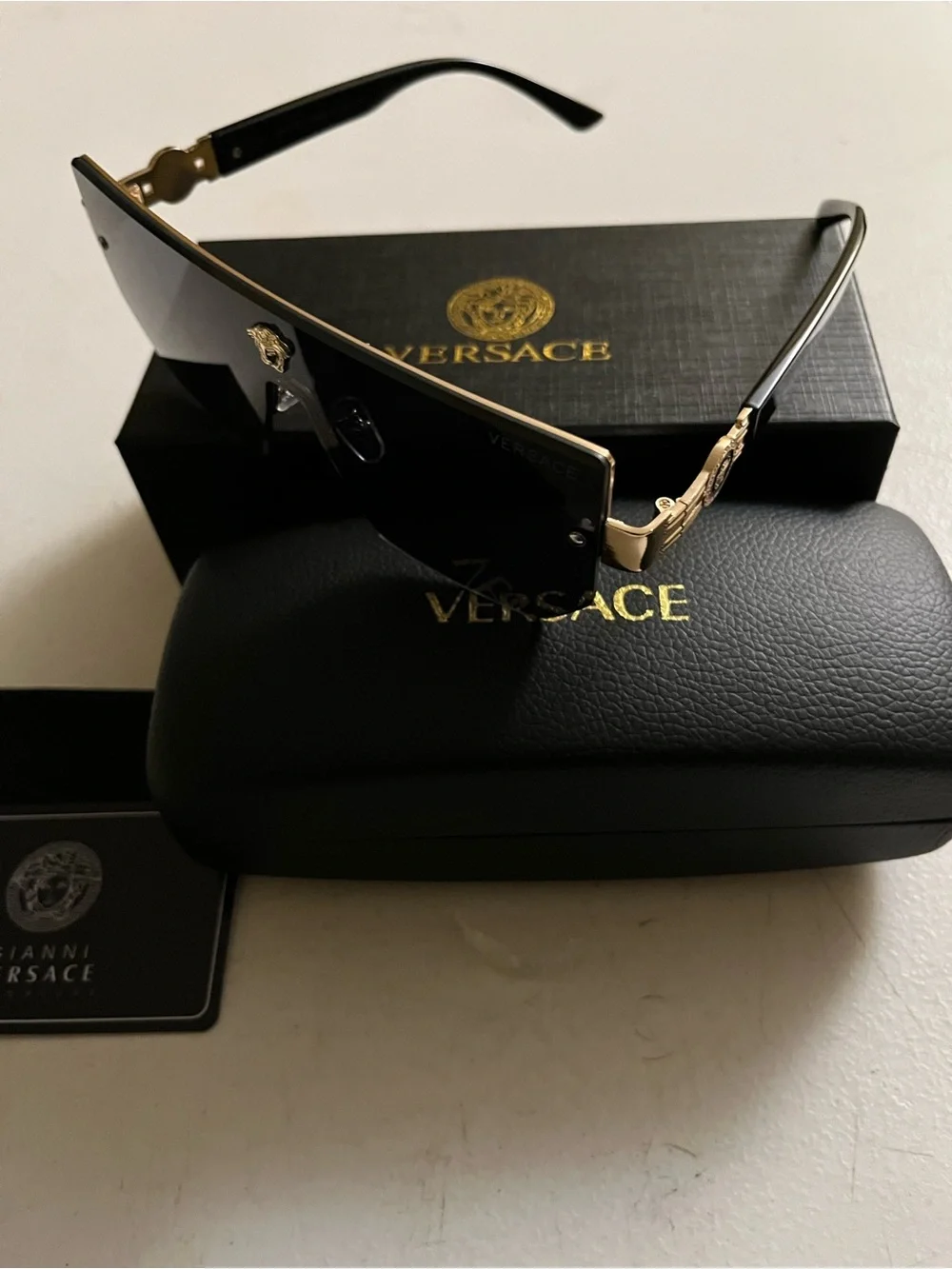 Versace Black Sunglasses with Gold Accents and Case